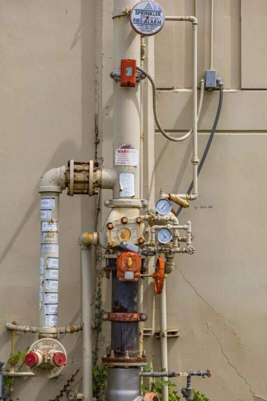 sprinkler system maintenance outside a building